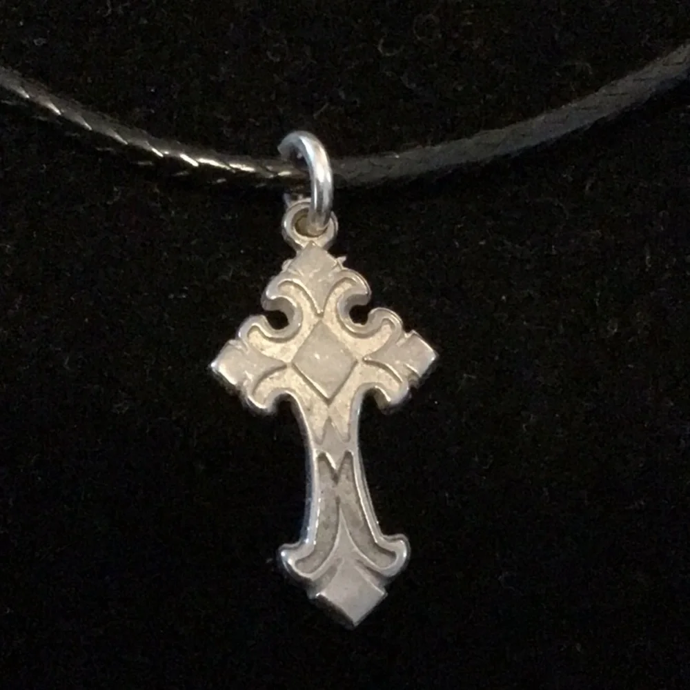 Tiny Sterling silver cross